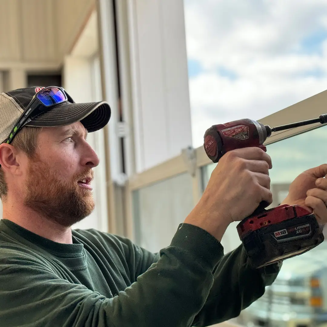 On Track technician installing a garage door